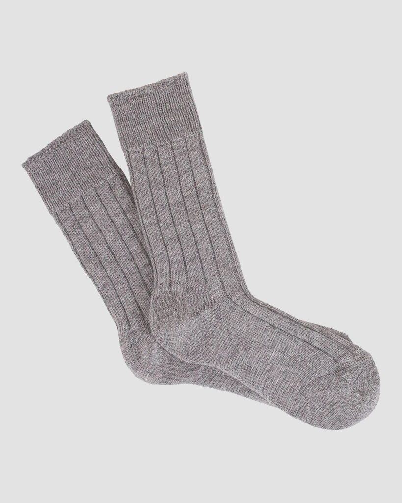 Our gorgeous British made Alpaca lounge socks are a luxurious partner for those treasured moments at home. Knitted to a dense weave, these Alpaca lounge socks simply sink into your feet. Wear them all around your home, or even on your travels. By Patriae®